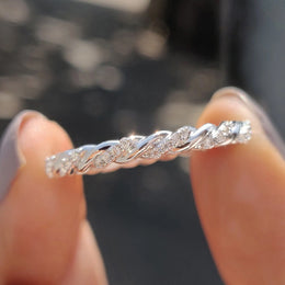 Twisted Eternity Band With Round Moissanite