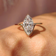 Solitaire Marquise Cut Engagement Ring In Rose Gold
