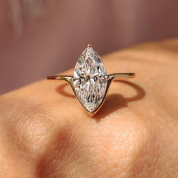 Solitaire Marquise Cut Engagement Ring In Rose Gold