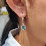 Oval Cut Earrings In Halo Style