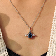 Three Stone Pendant With Royal Dark Blue Pear Moissanite