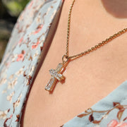 Gold Cross Pendant With Tapered Baguette Setting