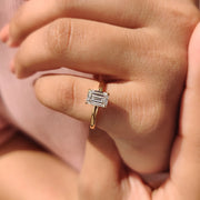 Emerald Cut Solitaire Ring In Yellow Gold With Basket Design