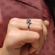 Cyan Blue Round Cut Engagement Ring With Twisted Pave