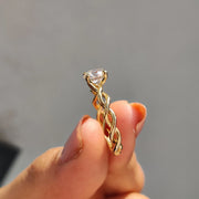 Round Moissanite Twisted Shank Engagement Ring