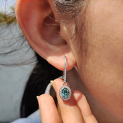 Oval Cut Earrings In Halo Style