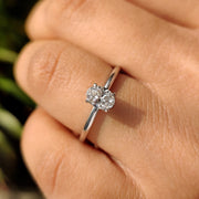 Oval Solitaire Engagement Ring With Hidden Halo