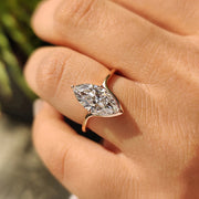 Solitaire Marquise Cut Engagement Ring In Rose Gold