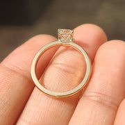 Emerald Cut Solitaire Ring In Yellow Gold With Basket Design