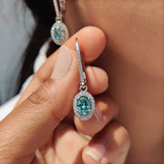 Oval Cut Earrings In Halo Style