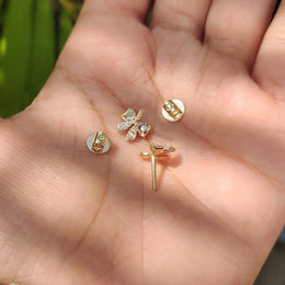 Round Cut Diamond Gold Bow Earrings