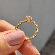 Round Moissanite Twisted Shank Engagement Ring