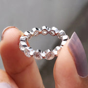 Round Eternity Band With Shared Prong