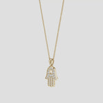 Pave-Set Lab-Grown Diamond Men’s Hamsa Pendant on a gold chain, featuring pavé-set diamonds in a Hamsa design.